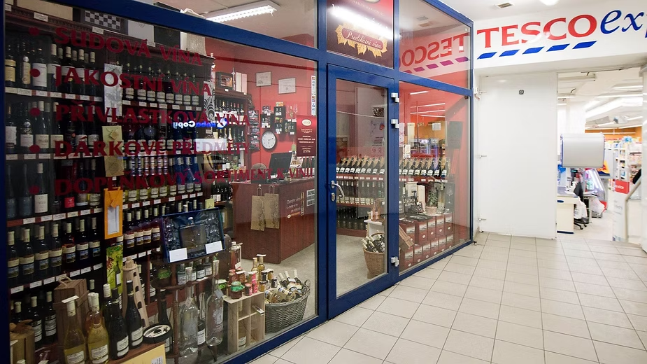 How should you light a store window?